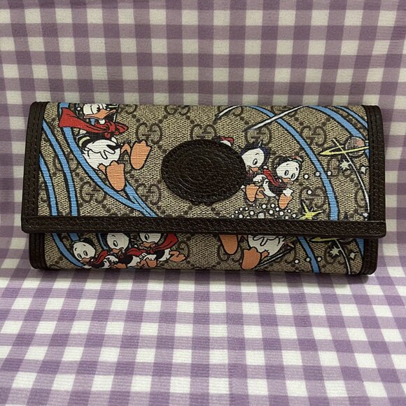 Gucci Tri-Fold Cartoon Coin Purse - Picture 1 of 9
